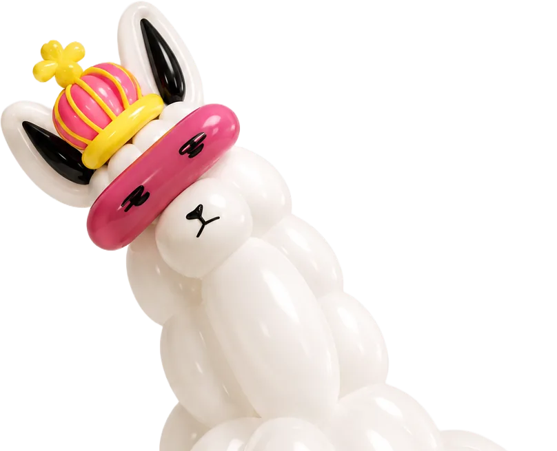 A glossy white balloon llama wearing a small gold crown
