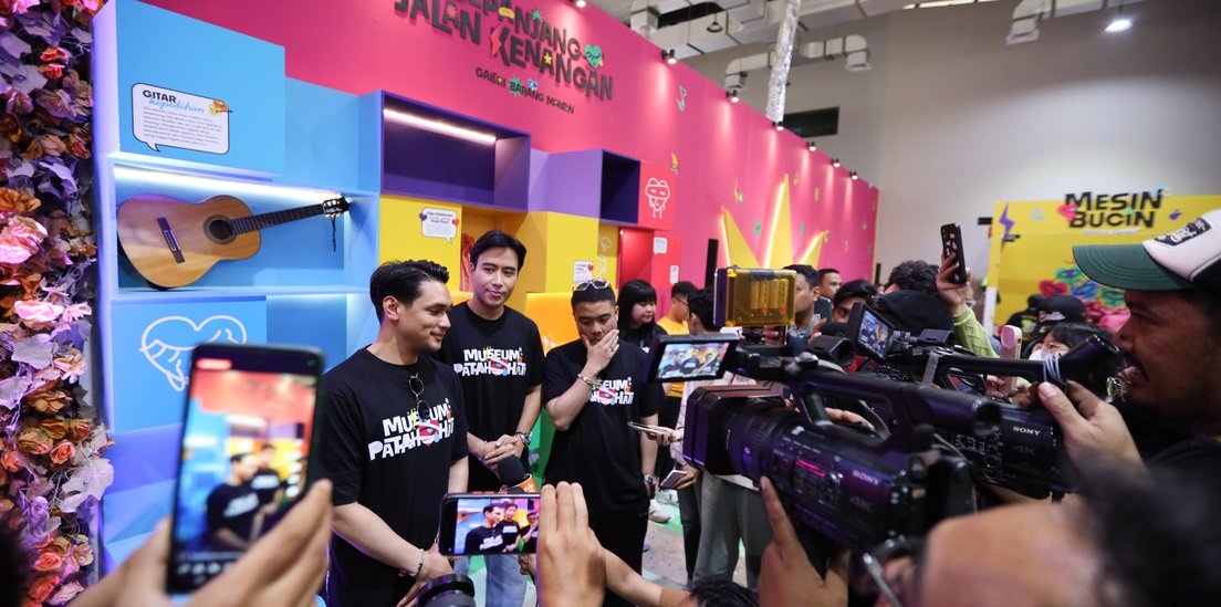 Photographers documenting a colourful brand activation