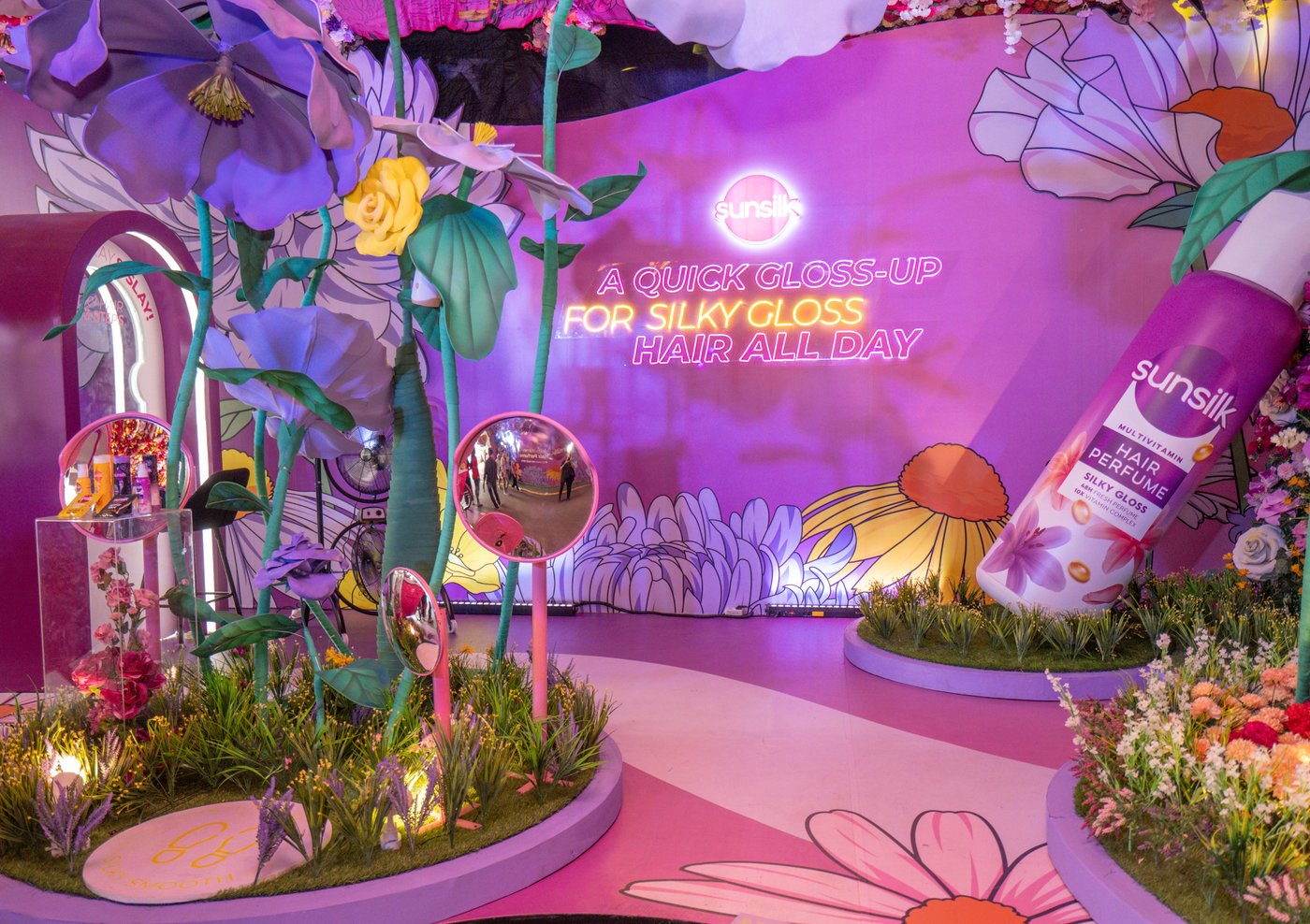 Floral garden installation interior with Sunsilk product close-up wall
